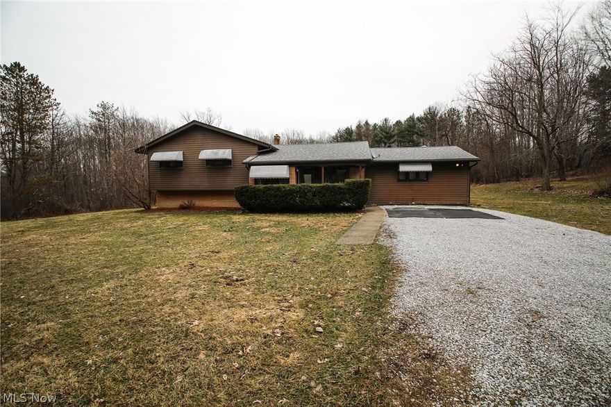 Come and marvel at this beautifully maintained, move-in ready Split-level home on 4.66 acres in picturesque Leroy Township, OH. The home sits back from the road for privacy and is surrounded by tall pines and mature woodland. The property includes access to a man-made, approximately half-acre spring-fed pond behind the home. There is also a 12x20 outbuilding for use as storage or as a workshop to conduct your favorite hobby. Inside the home, the spacious family room has a brick hearth that could accommodate your choice of a wood-burning or gas-fueled stove. There are three spacious bedrooms upstairs with plenty of closet space. The large upstairs bathroom was remodeled in 2017, and all appliances will stay. The open-concept kitchen/dining/living room area is perfect for entertaining. This is a superb value for the buyer looking for a peaceful country property that is only ten minutes from I-90. Schedule your showing appointment today!