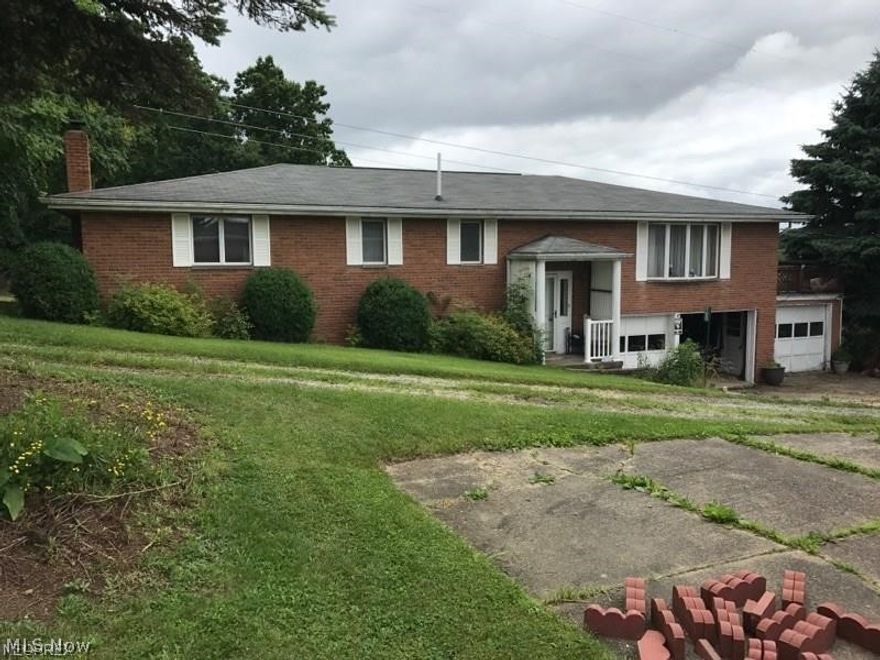 Three bedroom quality built brick ranch home. 2 Acre location on a very private street. Basement rec-room with fireplace. Main bath upstairs needs commode set.