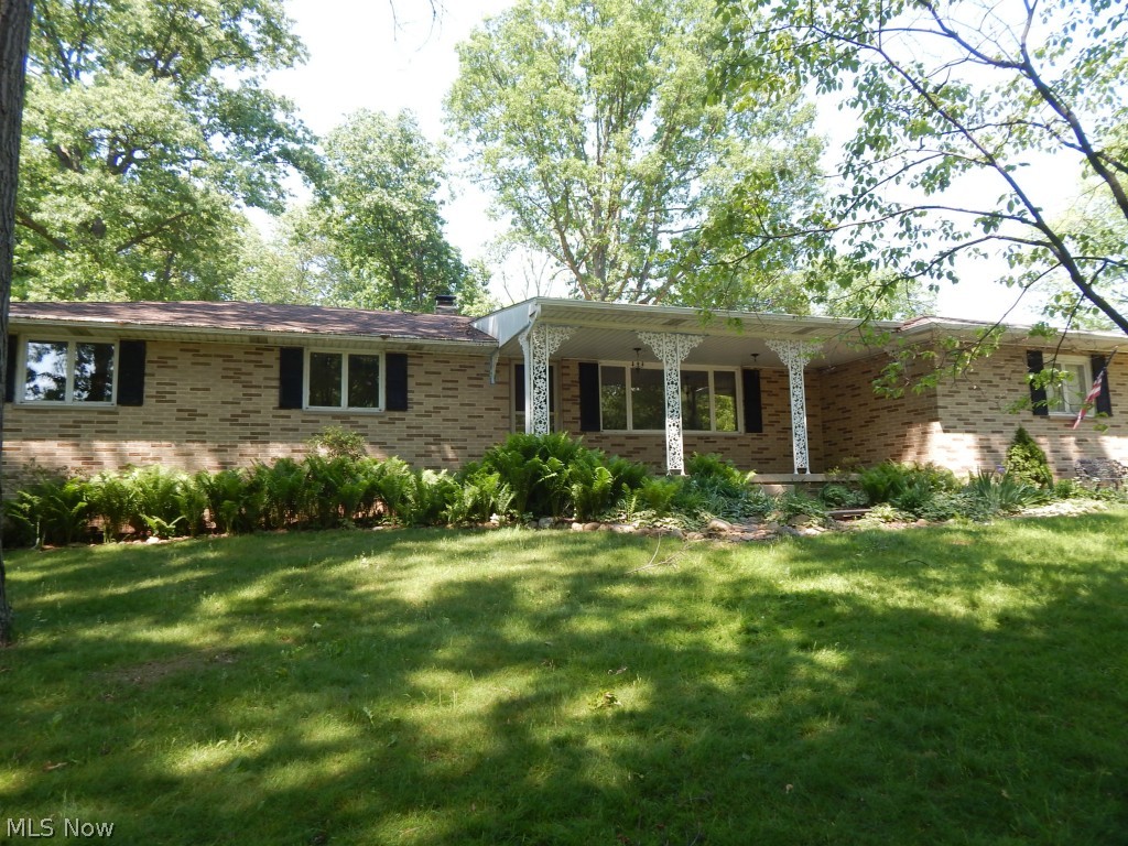 Sprawling Brick Face Ranch style home. Spacious living area, eat in kitchen with freshly painted walls.
Enjoy the day in the family room with wood burning fireplace. Nice size bedrooms, full size lower level
basement. Carpet in half of basement the other half storage and laundry. Two car att. Garage.
Other room is screen porch. Beautiful lot with flat back yard. Patio and much more.
Newer roof 2010 and city sewer connection 2010.