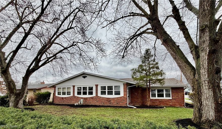 Spacious 3-4 bedroom ranch home situated on a desirable corner lot in a great Dover location! This inviting home features an open concept kitchen and family room perfect for everyday living and entertaining. The cozy family room offers a stone fireplace for added charm and comfort, while the sunroom provides a bright and relaxing space to enjoy year round. The primary bedroom includes a private bath for added convenience. Outside, you'll find a covered patio overlooking a fenced-in yard perfect for the summer BBQ's ahead and ideal for gatherings, pets, or play.  A 3 car oversized detached garage offers plenty of space for vehicles, storage, or a workshop. Don't miss this well located home with so much to offer!