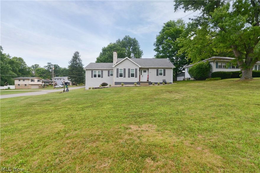 WOW! Looking for a ranch home with a spacious open concept floor plan? Don't miss this one, it is so much larger inside than you would think! Updated from top to bottom, this home offers fresh paint tones and finishes throughout.This home sits on a large corner lot. When walking thru the front door, the modern hues and finishes really set off the spacious open living room, dining and kitchen! Beautiful fireplace! Enjoy the fantastic updated kitchen with tons of cabinet and light finish quartz counter tops, beautiful subway tiled back splash,large pantry closet, large breakfast bar with all stainless appliances. Slow close cabinets and drawers. So much potential to fit your needs. Slider doors lead out to the raised deck overlooking the over-sized backyard. The owner suite will surprise you! Custom blinds. Electric fireplace. Private doors lead to a nice screened porch perfect for morning coffee or tea! Two sets of double closets and check out that private bath, modern with deep soaking tub & shower, granite counters and dual sinks. On the other side of the home are two nice sized guest bedrooms and a second full bath, updated with tub shower combo and granite counters. First floor laundry! The finished basement is awesome and definitely will grab your attention if a huge family room/rec/game center/hobby area is what you are hoping for! What an amazing space, and its completed with tons of storage space and a great half bath! Central Air. High Efficiency furnace. 6 panel doors. Roof is 4 years in age. Vinyl Windows. So Much More! Check this one out and schedule your appointment today!