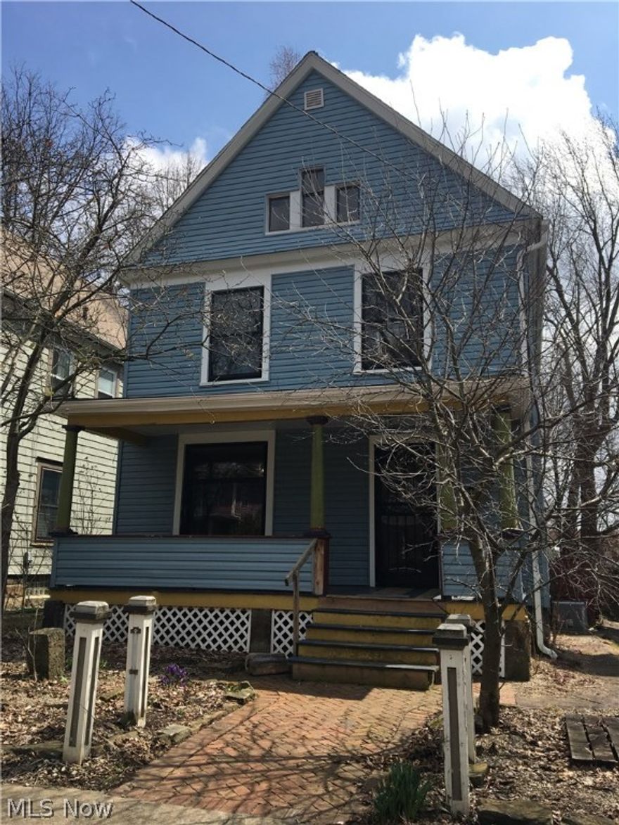 STUNNING "old school" charm and character throughout this Victorian style inspired home in HIGHLAND SQUARE!!! AWESOME woodwork and other original features everywhere you look!!! The large foyer boasts a wooden deacons bench and BEAUTIFUL spindled staircase!!! Leaded glass French doors lead into the living room offering an ornate fireplace, crown moulding and GORGEOUS hardwood floors with architectural inlay design!!! Restore the MASSIVE pocket doors that lead into the grand dining room also boasting French doors overlooking the fenced in back yard!!! A large kitchen and half-bath off the front corridor round out the main floor. Upstairs find 2 average sized bedrooms, and a HUGE master with double closets and LOADS of natural sunlight!!! The main bath has beautiful flooring true to the time, as well as a claw foot tub!!! The walk up third level is GIGANTIC and could be used for storage, or easily converted into additional living space/bedrooms, etc!!! Many "big ticket" items have been d