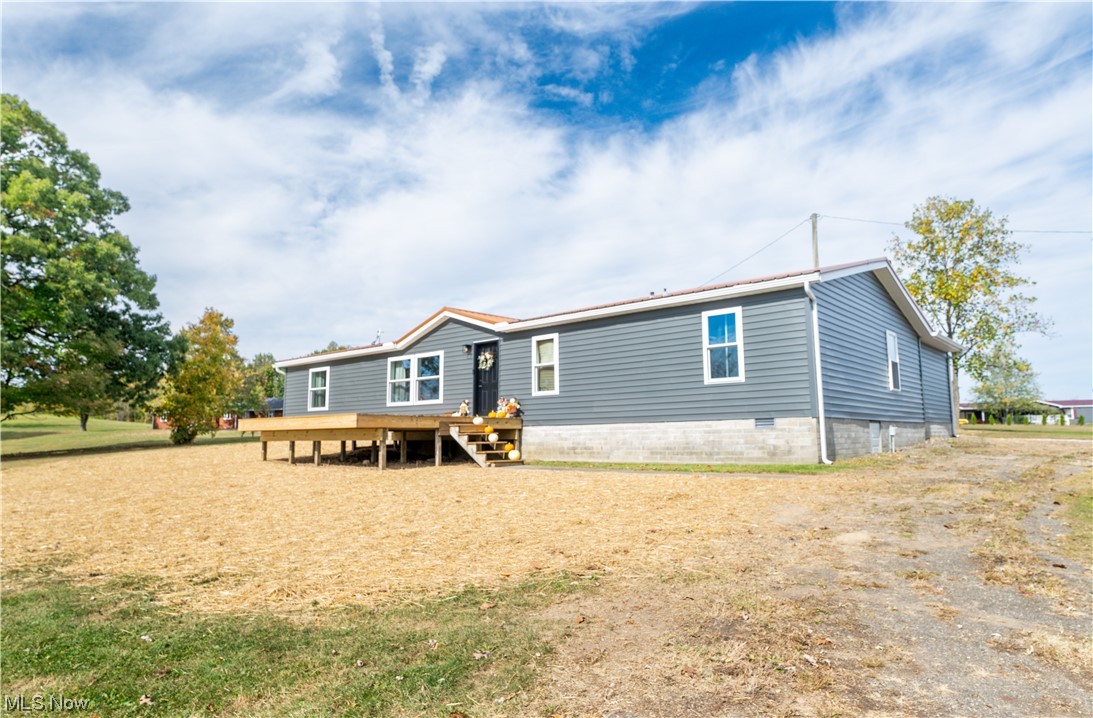 Welcome to this fully renovated ranch style home on 2.3 acres. Enjoy modern living and rustic charm with a wood burning fireplace, open concept layout with 4 bedrooms and 2 full baths/ The property offers peaceful country living with ample room for your hobby farm! 40x44' 4-stall barn with attached 30x40' pole barn, 2-car detached garage and 20x30' pavilion. Schedule your showing today!