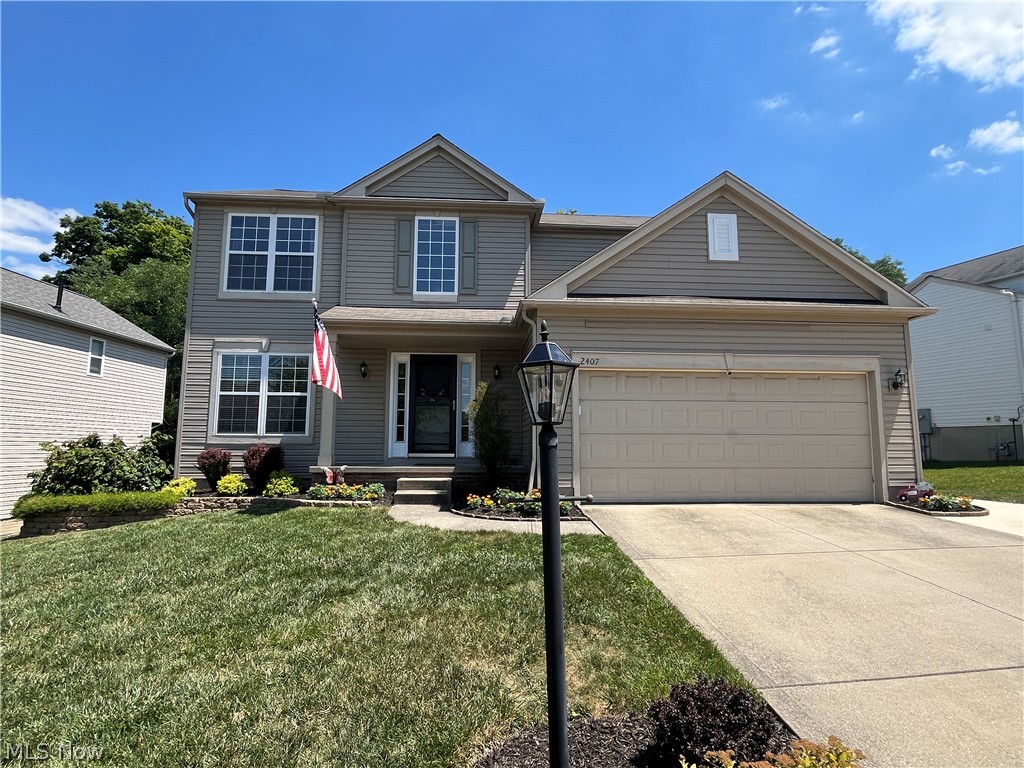 Here is your chance to own a move-in ready home in the desirable Calls Farm neighborhood! Situated on a private lot that backs up to trees, this home has everything you are looking for. The two-story foyer welcomes you into the four- bedroom home, along with the wood flooring and open concept. There is a formal dining room that leads you directly into the large eat-in kitchen, which has an abundance of cabinets, counterspace and an island! The living room is the ultimate spot for entertaining and relaxing, with loads of windows and natural light, and is centered by a gas fireplace. The laundry room and half bathroom are also on the first floor for ultimate convenience. Upstairs are three guest bedrooms and a full guest bathroom, along with the oversized primary suite, which has a vaulted ceiling, large walk-in closet and gorgeous bathroom that has been redone with a soaking tub, walk-in shower and dual vanity! The large basement is ready to be finished and has ample room for storage. In addition to all of the amazing living space indoors, you also get the benefit of the large deck off of the kitchen, along with ample yard space and a front porch. Call TODAY for your private showing of this amazing home!