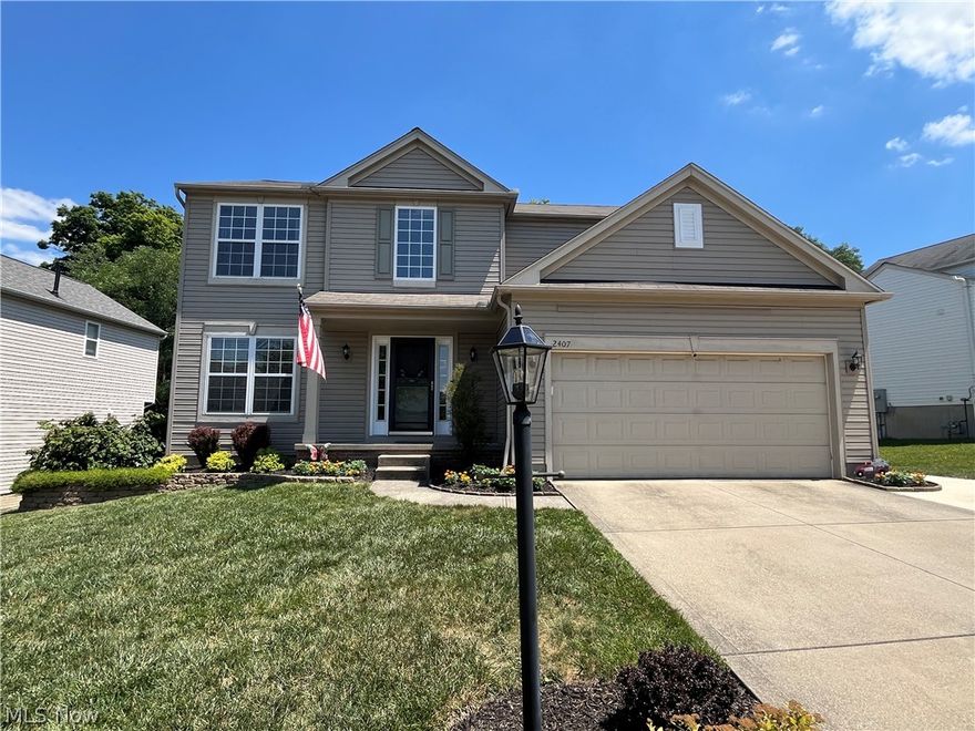 Here is your chance to own a move-in ready home in the desirable Calls Farm neighborhood! Situated on a private lot that backs up to trees, this home has everything you are looking for. The two-story foyer welcomes you into the four- bedroom home, along with the wood flooring and open concept. There is a formal dining room that leads you directly into the large eat-in kitchen, which has an abundance of cabinets, counterspace and an island! The living room is the ultimate spot for entertaining and relaxing, with loads of windows and natural light, and is centered by a gas fireplace. The laundry room and half bathroom are also on the first floor for ultimate convenience. Upstairs are three guest bedrooms and a full guest bathroom, along with the oversized primary suite, which has a vaulted ceiling, large walk-in closet and gorgeous bathroom that has been redone with a soaking tub, walk-in shower and dual vanity! The large basement is ready to be finished and has ample room for storage. In addition to all of the amazing living space indoors, you also get the benefit of the large deck off of the kitchen, along with ample yard space and a front porch. Call TODAY for your private showing of this amazing home!