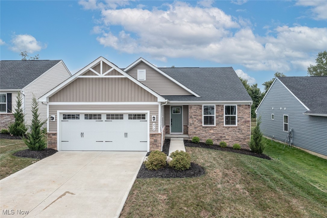 Built just 2.5 years ago, this 3 bedroom, 2 full bath ranch offers the ease of one-floor living with the benefits of a like-new home. You'll love the stainless steel appliances, granite countertops, 2 pantries, a great walk- in master bedroom closet and a tiled walk- in shower with built- in bench in the master bath and custom blinds throughout! The open layout flows comfortably into the kitchen, dining, and living spaces with direct access to a covered composite deck overlooking a small pond—perfect for morning coffee or evening gatherings. The full unfinished basement provides plenty of storage now and is ready for your future plans with an egress window and plumbing rough-in for an additional bath. Added convenience comes with lawncare and snow removal included in your low monthly HOA fees giving you more time to enjoy your home without the extra work and a great location with excellent freeway access to 71 and 76 making your trips to Cleveland, Akron, & Columbus a breeze! Just minutes south of all the action year round at Medina Square! Don't miss your opportunity to move into the now sold out community of Bates Ranches in Seville!