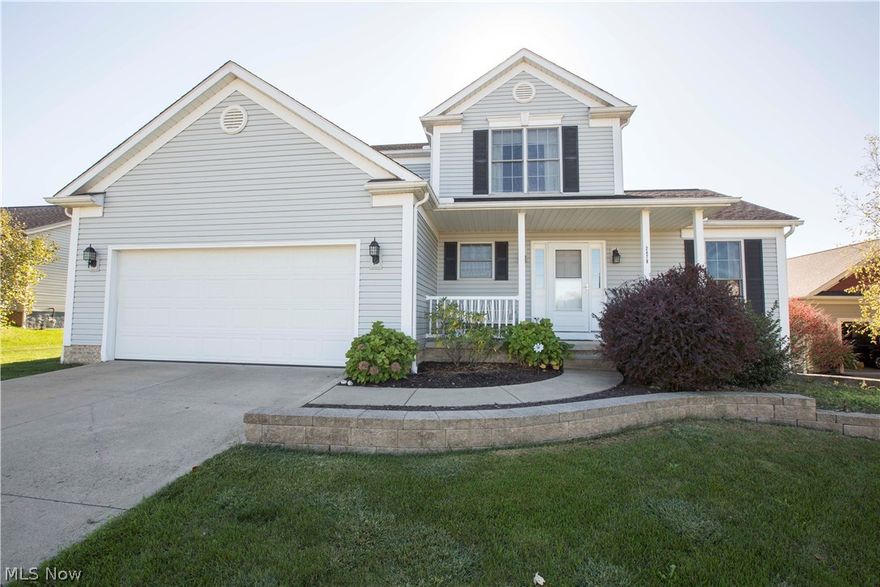 Inviting front porch welcomes you in to this spacious 3 bedroom 3 bathroom Custom Built Dutch Heritage home in the desirable Butternut Ridge Development.  First floor is an entertainers dream with formal dining room, living room and Great Room with Stone fireplace. Large eat in kitchen with Stainless appliances, island with additional seating and sliding glass doors to show off the views!  Laundry room, Foyer and bathroom complete this first level. 2nd floor has 3 bedrooms and 2 bathrooms. Master on suite is a private retreat  that has dual vanities, walk in closets, walk in shower and separate soaking tub. Lower Level boasts nearly 1100 sq. ft. of additional living area with endless possibilities! This home is on a large private country lot that has been professionally landscaped with paver landscaping walls, mature trees and an amazing deck! Tucked away in a country setting however minutes from KSU, NEOMED, and expressways! Home warranty included! Seller is even offering a carpet all