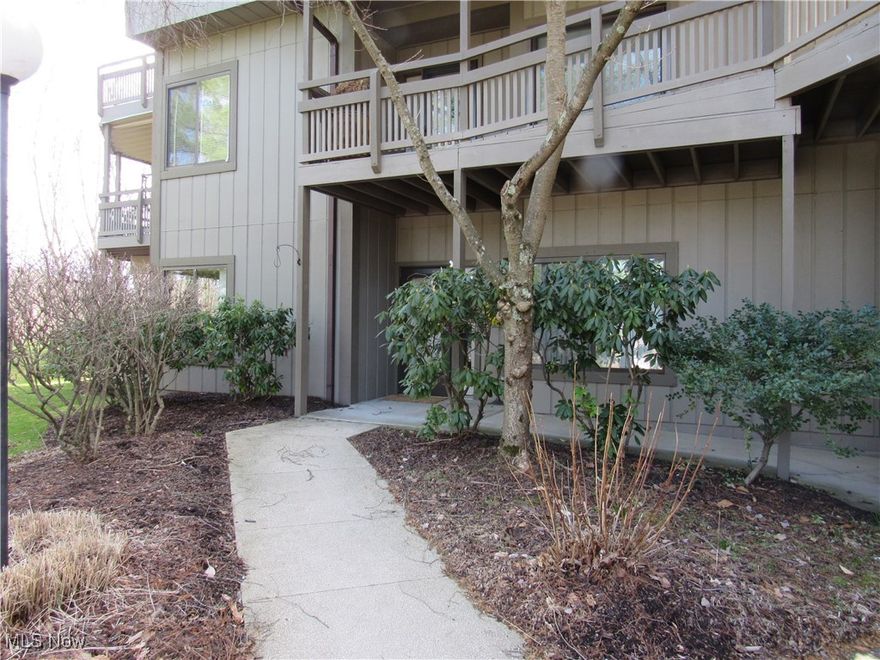 This ranch style one floor condo is absolutely stunning! You won't want to miss the views from every window! Located at the end of the development and off of a cul-de-sac, this condo features lots of privacy! When you enter the condo, you will notice the higher 9' ceilings throughout. There is a den or office located immediately to the left which could easily be converted to a third bedroom. The second bedroom is located to the right of the entrance foyer and features a walk-in closet and an attached spacious bathroom (which also opens to the hallway) and includes a linen closet. The great room is warm and inviting - and features a gas fireplace and windows w/ transoms that look out onto beautiful scenery and privacy in the back! Speaking of scenery - this unit will have gorgeous views for every season! The large kitchen has plenty of counters/storage and has a butcher block topped island for additional counter space and storage. There is an attached small den/TV room or could even be used as an additional eating area. The inviting dining room is off the kitchen and the hallway and features a tray ceiling, beautiful chandelier and pony walls that define the space. As you move down the hallway, you will notice the large laundry and utility room on the right - complete w/ washer, dryer and freezer and extra shelving for even more storage! The spacious owner's suite has a walk-in closet, en-suite bathroom w/ walk-in shower and whirlpool tub. The owners' bedroom also looks out to the amazing and private views! The garage is attached - you will need to walk through the covered walkway to enter the unit. There is additional storage in the garage. The development has a pool for the owners' recreation in the warmer months! The location of this condo and development is ideal - close to Merriman Valley, Cuyahoga Falls Market District and many stores and restaurants! You won't want to miss this opportunity to own this beautiful condo! Call today!