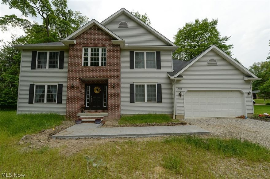 The best family home you will find in Stow!  Sitting on more than 3/4 of an acre, there is all of the privacy and play space you could ask for.  The back of the lot is a wooded wonderland.  This 4 year old home provides the updates and style of a new built home without being stuck in a cookie cutter neighborhood.  No HOA's, but on a beautiful and quite street.  Located in the Stow school district, minutes from Fox Den Golf Course and Silver Lake.  This home currently has 5 bedrooms and 3 full baths!  Two of the bedrooms are on the main floor, but could easily be converted back to a formal living room/office and formal dining room.  There is still a large family room, opening up to the dining area and big kitchen, that allows tons of common living space.  The kitchen has a large center island, and pantry.  Gorgeous dark wood covers the floors in the huge foyer and mud/laundry room.  The open stairway leads to a comfy loft area, perfect to relax and read.  Two large bedrooms, full bath a