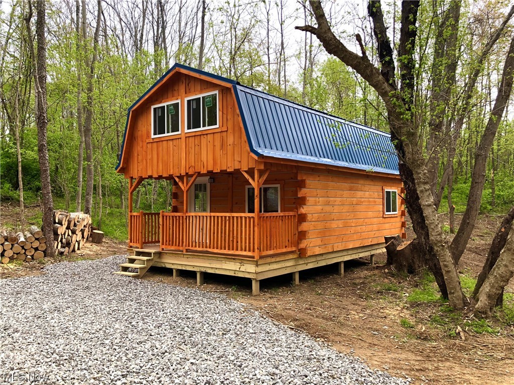 Perfect hunter's or outdoor enthusiast's retreat! This cozy, Amish built log style pine cabin is situated on just under 6 acres of heavily wooded ground. The beautiful cabin offers 2 bedrooms, a living room and possible kitchenette. A future bathroom is framed in and ready to be finished. Located in Muskingum County, one of the best white tail deer hunting counties in the state, and just seconds away from the Tri-Valley Wildlife Area which offers over 16,000 acres of public hunting land. Equipped with electric and a wood burning stove, this cabin has so much potential and would make a great getaway spot or investment property.