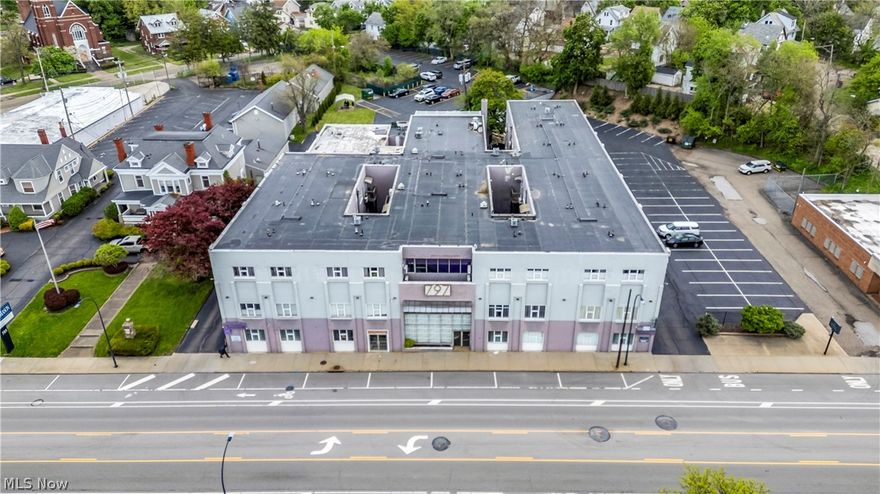 Occupying a prominent position in Akron’s thriving East Market Corridor, "The 797 Building" represents a rare opportunity to acquire a diversified, 66,000+ SF mixed-use asset with immediate equity potential. This three-story property is anchored by the prestigious Alexander Pierce Restaurant, providing a stable commercial foundation with a current lease of $9,000 per month. The building’s revenue is further bolstered by 40 luxury one- and two-bedroom apartment residences, which command monthly rents between $1,000 and $1,400. Extensive renovations completed between 2019 and 2020 modernized the infrastructure, including residential unit updates, the installation of energy-efficient mini-split heating and cooling, and significant upgrades to all common areas. Beyond standard residential living, the property offers an upscale hospitality experience through its members-only Coat Room Lounge and the innovative first-floor Screen Suites, which provide private dining and theater experiences. Residents enjoy a robust amenity package featuring a business center, exercise room, multiple club lounges with workspaces, a pool table, and private event spaces. Practical needs are met with onsite laundry services, full security and fire systems, multiple elevators, and off-street parking for 84 vehicles. Ideally located near the University of Akron, major medical hubs, and downtown Akron, this extensively renovated asset is perfectly positioned to capitalize on the region’s emerging growth.