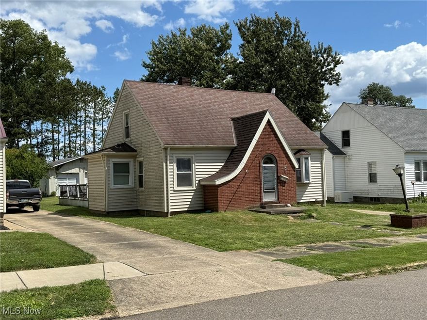 3 bedroom brick and vinyl home.  Hardwood floors in the living room.  Beamed ceilings in the oak kitchen with breakfast bar.  Sliding glass doors to the 22 X 30 vinyl deck.  Hardwood floors in the 2 main floor bedrooms.  Ceramic tile walk in shower in the main floor bathroom.  Private master bedroom on the second floor.  New gas furnace in 2025.   Vinyl sided, 30 X 24 (2+ car) detached garage & additional 1 car garage.  Bring your tools, this home has great potential.  Sells As-Is.