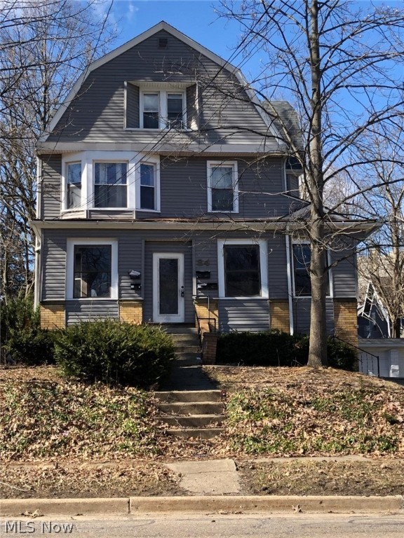 Adorable third story apartment located near Highland Square. The top floor of five unit apartment building offers privacy, off street parking, and spacious living area. Carpeted living room with fake decorative fireplace, two bedrooms, spacious bathroom, and efficiency kitchen. All utilities included. All interested parties should apply online with a $50 application fee.