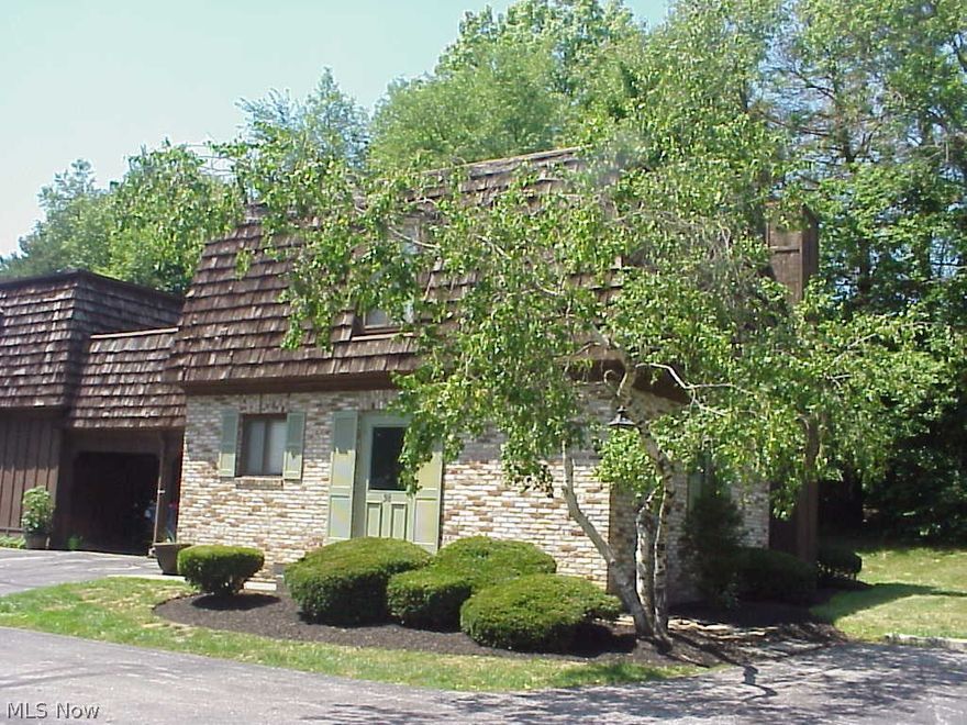 Stunning, fully updated contemporary condo. Newer kitchen, fireplace, hardwood floors. End unit, private patio backs up to woodland. Short walk to lake for swimming, boating and fishing. Just 5 min from I-71 or I-76. AC and furnace just 8 years old. A premium property!