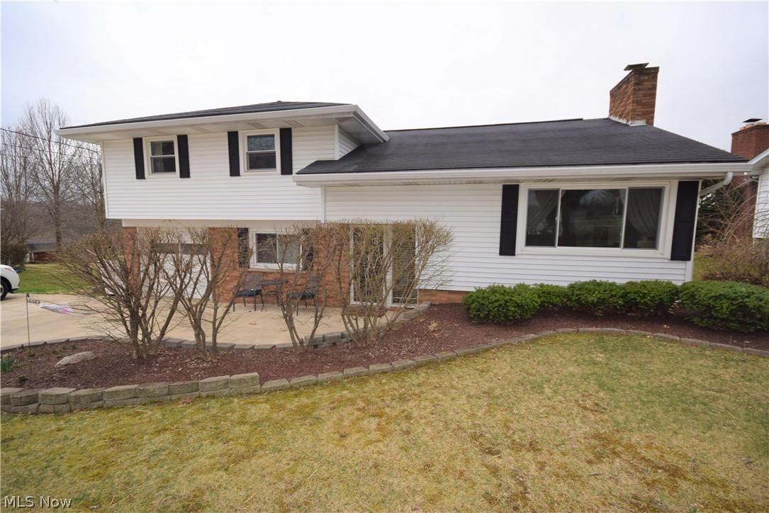 Welcome home to 1899 Deermont Avenue in Tuslaw school district! This darling split level offers plenty of space to roam. As you enter the home, you are greeted by a nicely sized foyer and large family room/den that leads to the lovely backyard. You will also find a half bath on this floor. Up one level is additional living space, kitchen and large dining area. Upstairs includes 3 bedrooms and a full bath. Updates include newer windows, an oversized concrete driveway, electrical panel (2019), vinyl fence (2018), and a well pressure tank (2019). The half-acre lot is situated in close proximity to the towpath! Don't miss your chance to call this gem of a home yours! Call today to schedule your private showing!
