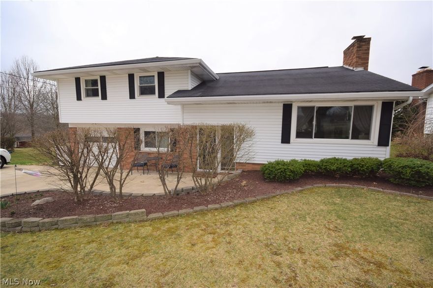 Welcome home to 1899 Deermont Avenue in Tuslaw school district! This darling split level offers plenty of space to roam. As you enter the home, you are greeted by a nicely sized foyer and large family room/den that leads to the lovely backyard. You will also find a half bath on this floor. Up one level is additional living space, kitchen and large dining area. Upstairs includes 3 bedrooms and a full bath. Updates include newer windows, an oversized concrete driveway, electrical panel (2019), vinyl fence (2018), and a well pressure tank (2019). The half-acre lot is situated in close proximity to the towpath! Don't miss your chance to call this gem of a home yours! Call today to schedule your private showing!