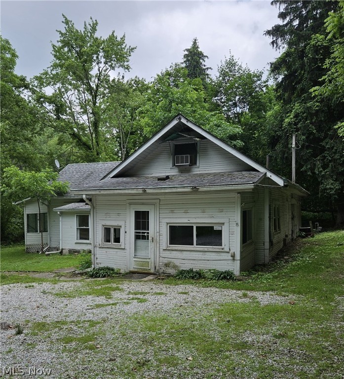 THIS RENTAL IS IN THE PROCESS OF BEING RENTED. Very private 5 bedroom/1 bath for rent right on the Portage Lakes channel that attaches to Long Lake. Interior freshly painted and new carpet has been installed. Eat in kitchen, laundry hookups in the 1st floor utility room. One acre with 2 outbuildings and a dock/deck on the water. Several enclosed porches. Pets permitted - $25 monthly pet rental per pet / $250 non-refundable pet rental required. Tenant(s) are responsible for all utilities, lawn/yard maintenance and snow removal. One year lease minimum. No indoor smoking. All adult applicants must apply online for credit, background, eviction history. $50 non-refundable application fee per adult applicant. Please contact listing agent for requirements and please do not apply without viewing the property.