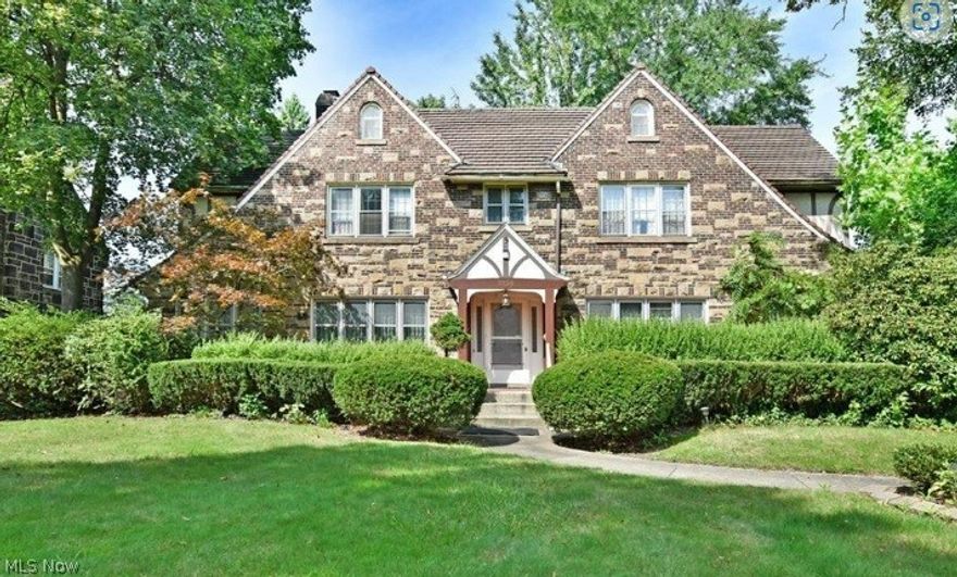 Stunning Brick and stone Tudor with amazing Charm. 6 bedrooms, 3 full and 2 half bathrooms, formal dining room, formal living room, sunroom, eat in kitchen, 1st floor laundry with and mud room. Master suite with fireplace, beautiful wood trim throughout, gorgeous windows and architecture. So much to appreciate in this custom-built lovely home. Make an appointment to see and appreciate this one-of-a-kind estate. 3 car garage!