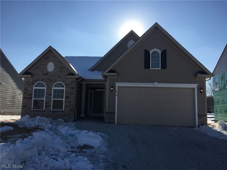 Immediate move in available! Gorgeous ranch spec home with beautiful options! Stone exterior, cathedral &amp; vaulted ceilings, sunroom, stone fireplace and upgraded flooring throughout set this home apart. A full finished basement with an additional full bathroom give even more space to entertain or relax. This home has an open layout with a large foyer leading into the great room and kitchen. The kitchen is upgraded with granite, painted hazelnut and espresso cabinets and a large island. The kitchen opens to the great room which features cathedral ceilings and a beautiful stone fireplace. The owner’s suite is large with a huge walk in closet and private bathroom with a walk in shower. Other features in this home include brand new upgraded flooring, a large laundry room, Call the Heisley Park model for more information or to tour this spec home.