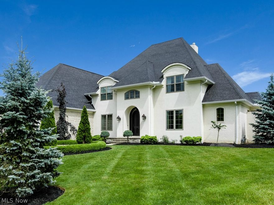 Exceptional custom built home in the prestigious Glencarin Forest.  A grand entrance with a curved staircase opens into the spectacular 2-story lofted great room and impressive dinning room.  The kitchen, overlooking the gorgeous hearth room, is truly remarkable in quality and attention to detail including stainless tile backsplash, gorgeous granite and an extended island prep area.  One of a kind first-floor master bedroom boasts 2 walk-in closets, a gas fireplace, and a remarkable master bathroom with a stunning soaking jet tub, glamorous tile shower, heated travertine floors, marble counters and custom cabinets.  Separate guest living suite on the second floor offers an en suite bathroom and full walk in closet.  Three more bedrooms complete the second floor with the lofted view over the great room to the private backyard.  Entertain on the back patio area with the wood burning fireplace and professionally designed landscaping.  This incredible home offers the highest quality crafts