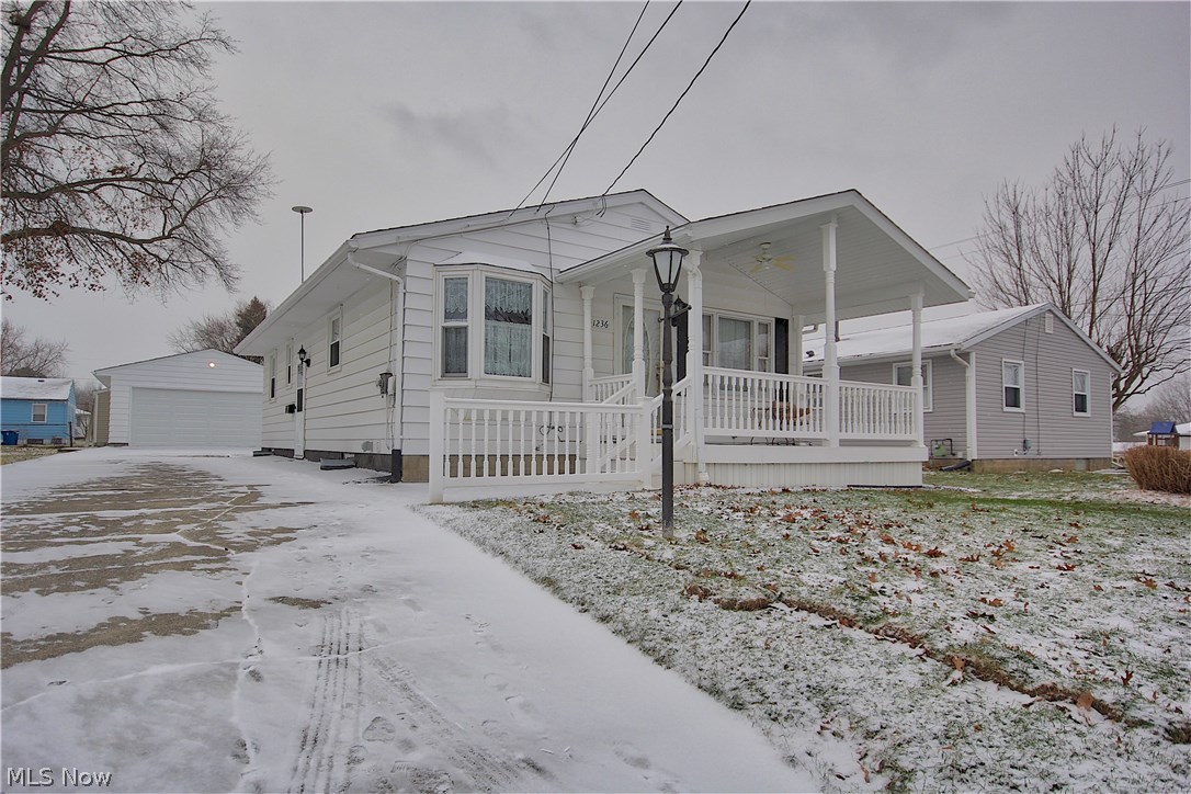 Welcome to 1236 Stratford - Immaculate Three bedroom Ranch home! This home features an inviting front porch with low maintenance composite decking and an outdoor ceiling fan. Spacious Kitchen with new flooring(2016) opens to eating area with gorgeous bay window. Living Room with hardwood floors. Freshly painted interior throughout the first floor(2016). Nice clean bathroom w/ tile floor. Neutral décor throughout. Waterproofed basement(2016) with transferable warranty. This basement is dry and ready to be finished - 1/2 bath installed. Tons of storage space. Two car detached garage w/ new door and concrete driveway. This home is move in ready! Call for your appointment today.
