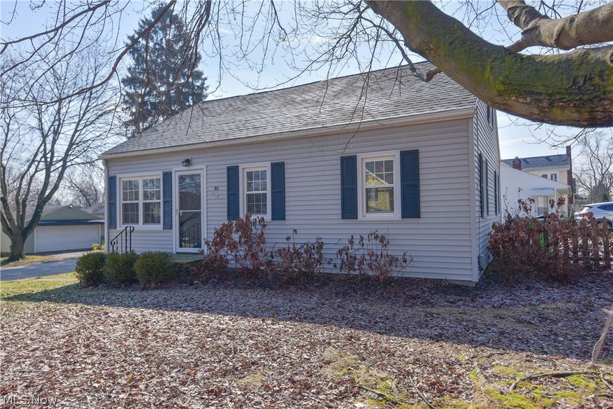 Cozy, yet spacious, 4 bedroom Cape on large corner lot w/ two additional parcels. Freshly updated contemporary kitchen w/ stainless steel appliances & breakfast bar leading into the open floor plan living room complete with gas burning fireplace for ambiance & warmth galore.  3 main floor bedrooms plus large, open, dormered 2nd floor bedroom/office suite.  Gleaming newly refinished hardwood floors, new paint, new carpet, glass block windows, updated mechanicals, stamped concrete walkway & patio for relaxing evenings outdoors, with gardening area surrounding entire home. Basement includes finished family room with built ins great for entertaining, gaming, or movie nights. This house has so much to offer. Make it your home today.