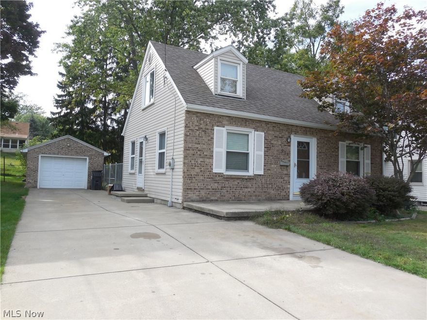 Nicely maintained and loved, this cape cod will grab your attention right from the start with its excellent curb appeal and beautiful exterior. The brick facing on the home and garage give it some extra pizazz! Inside, there are hardwood floors throughout the first floor in the living room and the two first floor bedrooms. Neutral paint tones. The kitchen comes with appliances and the stove and built in microwave are only two years old. The countertops in the kitchen also were replaced two years ago and there is a nice moveable island that comes with two stools for your eating area! The first floor full bath was updated in the past and has ceramic tiled floors and shower surround, pedestal sink and a glass block window for privacy. Upstairs is a oversized third bedroom with a nice alcove for a office or many other options for use there! Additional closet space as well. The basement was waterproofed by the previous owner and there is some great space ready for finishing. A second full b