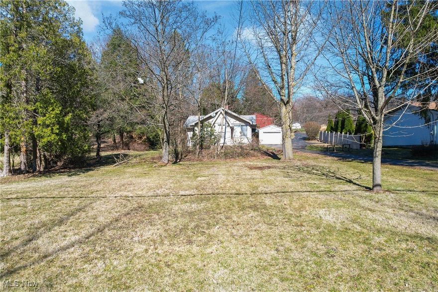 Charming 2-Bedroom Ranch on 3.67 Acres – Endless Potential! Welcome to 313 Southeast Ave, Tallmadge, OH 44278—a unique opportunity to own a 2-bedroom, 1.5-bathroom ranch on an expansive 3.67-acre lot! This property offers plenty of space, multiple garages, and a fantastic location, making it perfect for those looking to add their personal touch. Inside, the home features a functional layout with a cozy living area, a spacious kitchen, and two well-sized bedrooms. While the home needs updates, it provides a solid foundation for renovations to suit your style. One of the standout features of this property is the garage space—a 1-car detached garage plus an additional 3-car detached garage, offering ample room for vehicles, storage, or a workshop. The large lot provides endless possibilities for expansion, outdoor activities, or even hobby farming. Conveniently located near shopping, dining, and major highways, this home offers a blend of privacy and accessibility. With some TLC, this property could become the perfect retreat! Don't miss this rare opportunity—schedule your showing today!