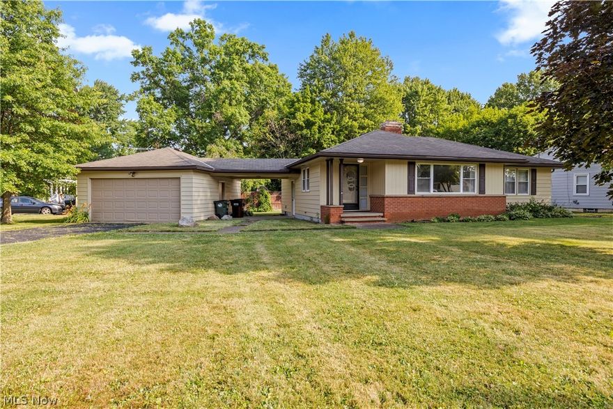 Lovely and charming ranch home in Elyria. This home features three bedroom and one bath all on the main floor, also on the main floor is this large living room with a fireplace for looks, and lots of natural light from its large windows. The kitchen was freshened up around 2014 with new cabinets, counter tops and flooring. The bathroom has a full bathtub with handicapped equipped shower, as well as a full stand up shower. This beauty also has a full unfinished basement which someone could turn into the family room, gaming room, craft room they always wanted. This is perfect for a first time home buyer or someone looking to right size their situation. The home has a smaller backyard. A nice two car detached garage with an attached roof to the house over the side porch. Set up a showing to see this well maintained home.