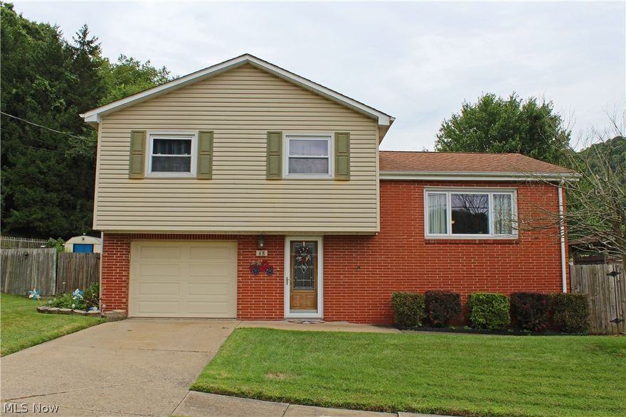 Say yes to a new address! This nice 3BR multi-level home is waiting for you. Lovely entry with hardwood floors extending into the spacious living room and new kitchen with granite countertops and stainless appliances. Lots of updates including gas furnace, entry doors, and roof. Don't be the last to see this home! Home Warranty included.