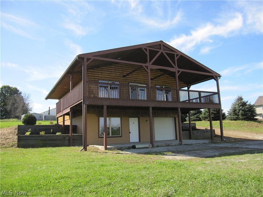If you love beautiful views, this home is for you.  Built in 2000, this Log home has 3 bedrooms, 2 1/2 baths that sits on over 31 acres.  It also has a beautiful Great Room with vaulted ceiling, Stone fireplace, Finished Walk out basement, a very Large covered deck just off the Great Room overlooking a 3+ acre pond with two small approved fisheries stocked with all kinds of fish (Bass, Blue Gill, Carp, Trout etc) together with laundry hook ups on the main floor and lower level.  Call today to view this wonderful log home on 31.5 acres, nestled back off the road with beautiful views.