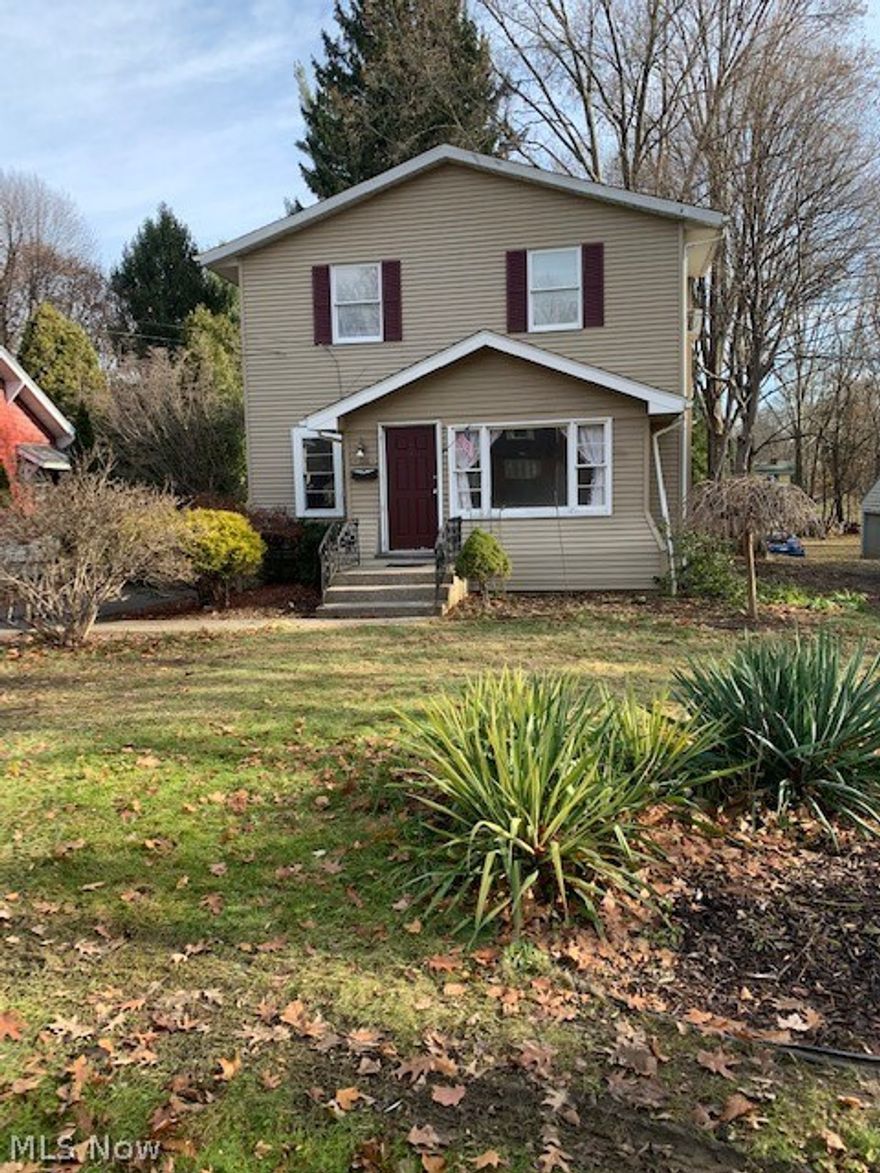MOTIVATED SELLER!!!  Have you been looking for a 4 bedroom house in Stow that is actually affordable? Bring your finishing touches. This large home also features 2 bedrooms and a full bath on the first floor, and 2 more plus another full bath on the upstairs, an enclosed front porch, a massive back deck, a partially fenced back yard with a pond water feature, multi-level landscaping and a 2-car detached garage! The sellers just replaced the living room and the dining room flooring with new gray LVP flooring this month and painted the house in current color trends!  The master bedroom is absolutely massive and has 3 closets! There are 2 furnaces with one being new in 2021 and the upstairs one new in 2010. New AC in 2018. Some of the windows are vinyl replacements. With well water, you won't have a water bill!!  Beyond the gate of the fence, the new owner will find a large beautiful "park-like" back yard ready for all of your summertime outside activities! The sellers have made many repa