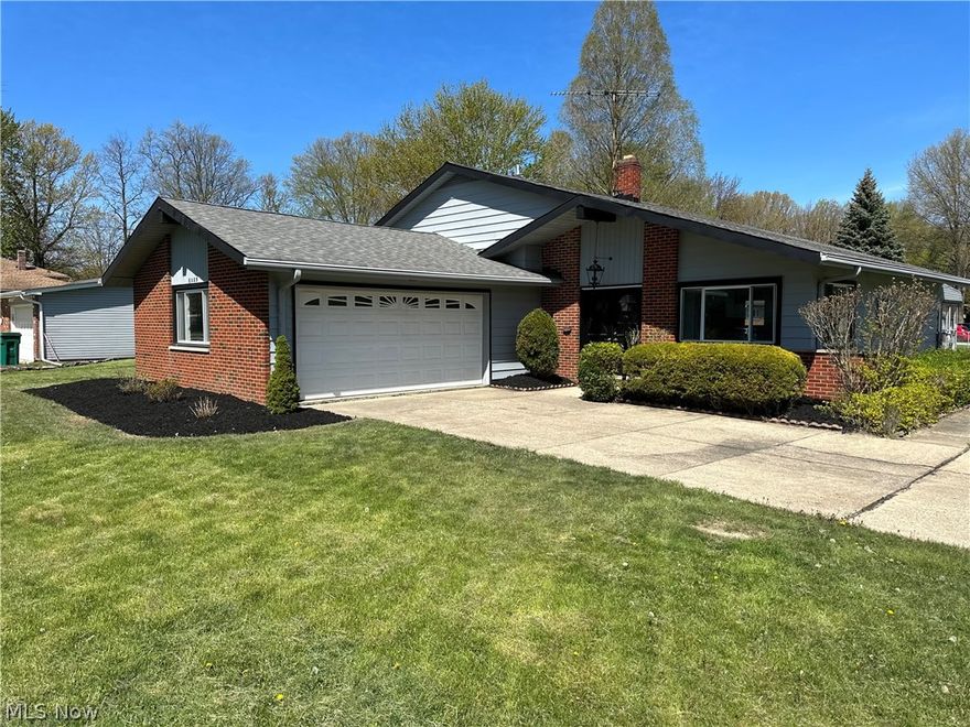 Welcome to this updated home on a large corner lot in desirable Mentor! When you walk into this home you will love the updated kitchen and living space. The kitchen is completely new with white shaker cabinets, tile backsplash, stainless steel appliances, and LVP flooring! There is also a sit up breakfast bar which is perfect for enjoying a cup of coffee or even doing some work. The kitchen is semi-open to the living and dining space on the main floor allowing good sight lines and flow of communication while in the kitchen. Upstairs you will find the three bedrooms all with fresh paint and original hardwood floors. The main bath is located on this upper level and equipped with a brand new tub/shower combo and new LVP flooring. On the lower level half the space is newly finished and is perfect for a family room, play room, or workout area. This space has a door out to the garage. On the other half of the lower level are the mechanicals, laundry, another full bath with a shower, and plenty of room for storage. This space has new vinyl flooring in the main mechanical space and LVP in the bathroom. The home has an enclosed porch you can access from the sliding door off the dining room. This looks out on the large fenced in backyard, perfect for families and pets! Seller to install Front storm door and new front door windows. You definitely want to check this home out, schedule your showing today!