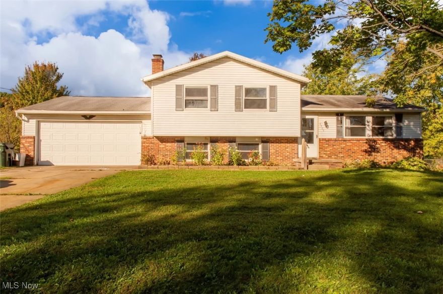 Discover the perfect blend of comfort and functionality in this split-level home, featuring three bedrooms, one and a half bathrooms, and a prime location within the highly regarded Green school district. Once you are inside, you'll appreciate the generous size living room, dining room, and open kitchen. The upper level boasts three spacious bedrooms, and a full bathroom. The lower level presents a warm family room with a fireplace, an additional versatile room, and a half bathroom. The basement provides a practical laundry area and ample storage. The sprawling backyard invites endless entertainment opportunities. Arrange your showing today.