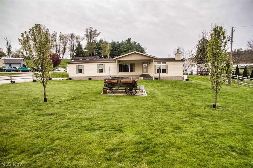 You don't want to miss out on this one. Well maintained and in immaculate shape, this 3 bedroom home is move in ready with a lot of quality updates. Covered back patio with stone flooring and privacy vinyl fencing. Front has a covered porch. Landscaping. Spring is here so blooming is occurring. Kitchen/dining combo. Walk down to the sunken living room that has a beautiful stone wood fireplace. Master has a walk in closet. You can relax in the master oval tub. Laundry first floor. Security system. No need to worry if power outage happens. This home has a Generator. Minutes from I-70 and close to a lot of amenities. Well worth seeing. Make your appointment today!