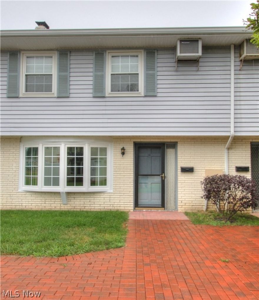 Spacious condo, laundry area in unit. All appliances stay. Wood burning fireplace in living room. Winding stairway in open foyer. Formal dining room. Heated attached 1 car garage.