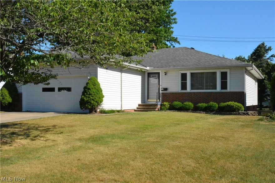 Spacious Three Bedroom Ranch with Hardwood Floors Through Out * Foyer Entrance* Family Rm * Two Car Attached Garage *Freshly Painted in 2016 * Electrical Panel and Hot Water Tank 6/16 * First Floor Utility Rm. * Large Eat in Kitchen * Ceiling Fans *Attic Storage * Great Location * Park and Recreation Right Down the Street* Full Basement with Glass Block Windows * Newer Storm Doors.Move in Condition * Dining Room Light Fixture not included* Must See