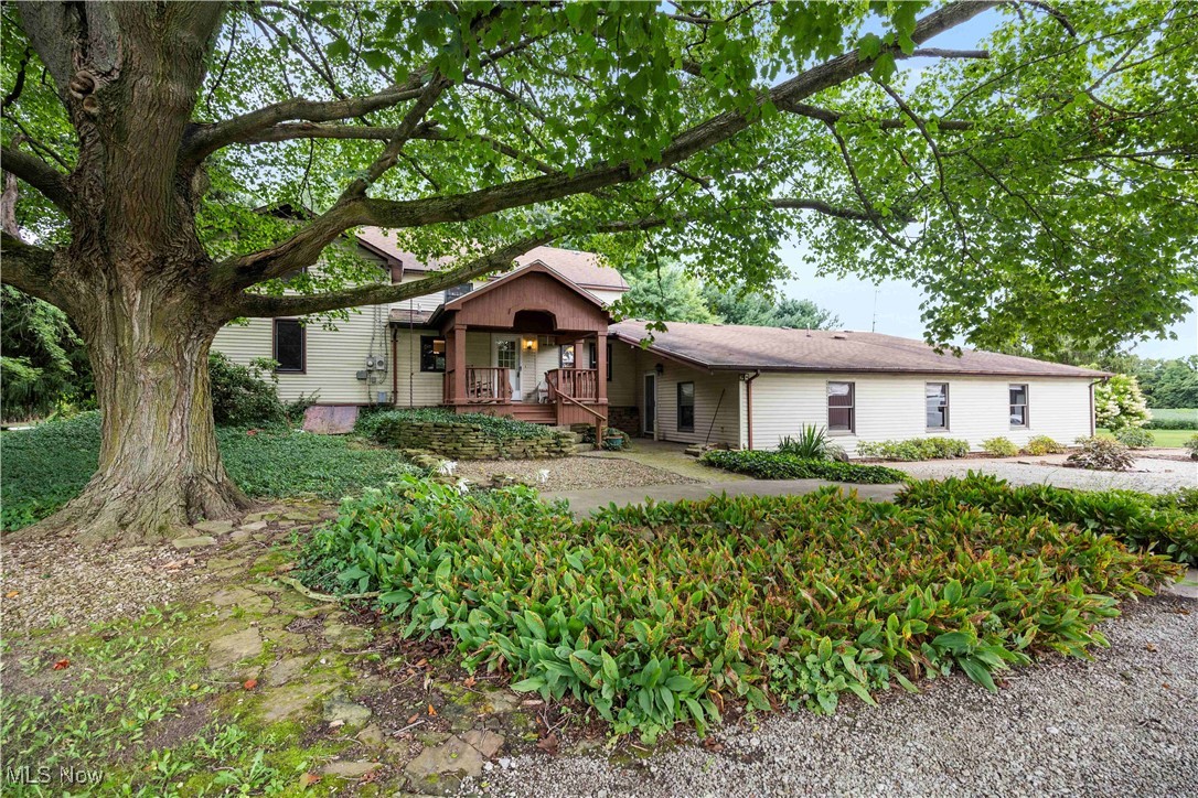 This remarkable nearly 4,000 sq ft home, built in 1865, offers timeless character and endless opportunities on 2 picturesque acres. With 6 spacious bedrooms and 5.5 baths, the home has been thoughtfully designed to accommodate a variety of living arrangements. Its flexible layout can easily be divided into separate spaces, making it perfect for a multi-generational household, a private mother-in-law suite, rental income potential, or even an enchanting bed and breakfast. The property includes a large barn with a 4-car garage, providing ample storage, workshop space, or room for hobbies. Surrounded by a park-like setting, the grounds invite relaxation and recreation with plenty of room for gardens, outdoor entertaining, or simply enjoying the peace and privacy. Located in the Edison school district, this historic residence combines old-world charm with modern convenience, offering a truly unique opportunity to create your dream lifestyle or business venture.