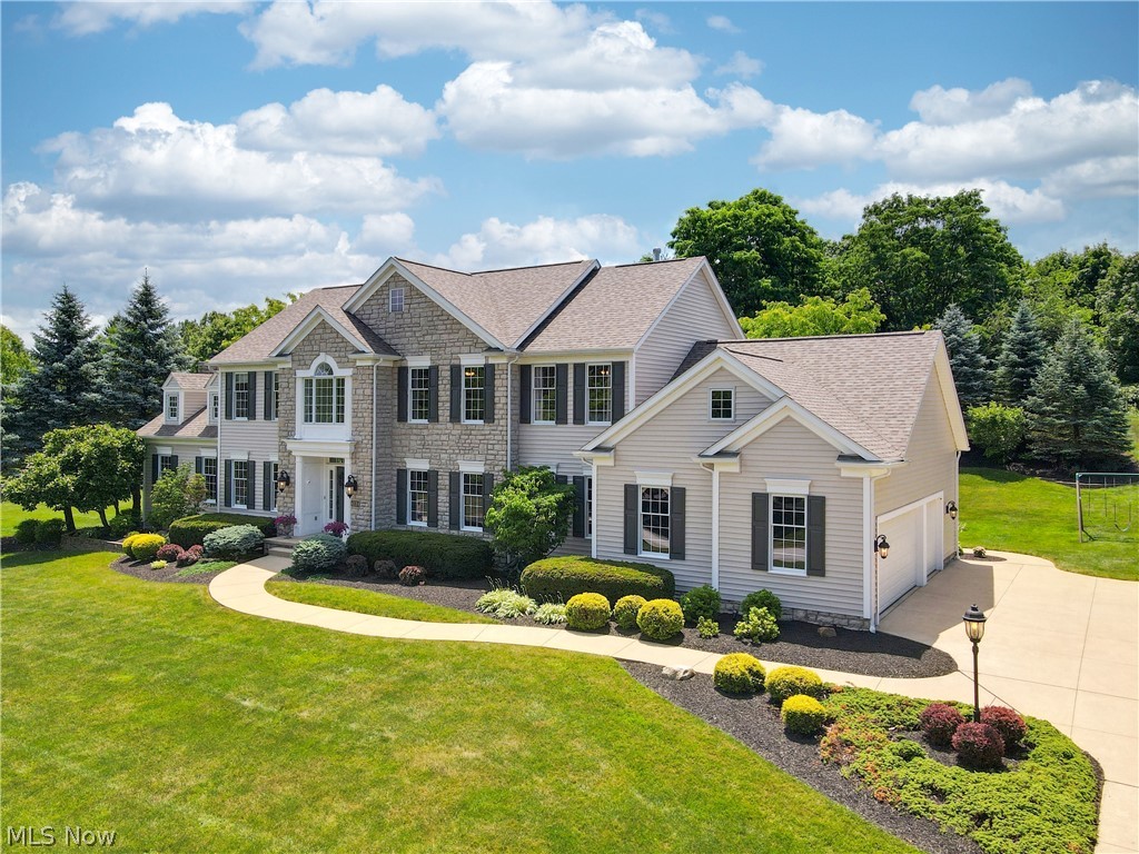 This classic colonial is situated on a 2 acre parcel in the desirable Forest Ridge neighborhood. Quality built by Prestige Home Builders and offers a spacious, light, bright and open floor plan. A Gracious foyer leads to a living room/office and formal dining room. Site finished hardwood floors flow through the first floor to the large eat in kitchen with ample cabinets and quartz counters. The kitchen and eating area are perfect for entertaining. The large island provides plenty of work and serving space. The adjacent walk-in pantry will take care of all your storage needs. The vaulted Great Room and adjoining sunroom are inviting for relaxation and entertaining. A private study and large laundry room complete the main floor. The kitchen and sunroom exit to a covered back porch that leads to a sweeping brick paver stone patio with stone wall and fire pit. Dual staircases lead to the second floor offering five bedrooms and three full baths. The elegant master suite features a vaulted ceiling and luxury bath with large walk in closet. There's another ensuite bedroom at the opposite side of the house. This elegant home features a fabulous in law or teen suite with all the comforts of your own private space. The lower level includes a complete working kitchen, laundry room, sitting area and 2 additional bedrooms. Over the last couple years the owners have updated the exterior of the house. A new roof, vinyl siding, trim work and skylight were installed in 2021. The house has been freshly painted and all of the old wallpaper has been removed. Neutral decor with todays colors. In 2022 the owner renovated the rear porch area by replacing the foundation and installation of composite decking. For even cooling and comfort both air conditioners were replaced in 2020. Both hot water tanks have been recently replaced as well. The complete basement kitchen was installed in 2020. The home is in excellent condition and shows really well! Dont miss this one !!!