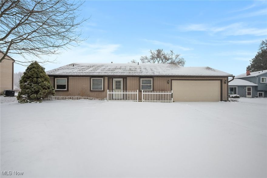 Beautiful and bright 3-bedroom, 2-bath home offering an open, inviting layout and fantastic living spaces throughout. High ceilings and abundant windows fill the great room, dining area, and kitchen with natural light, all overlooking the fenced backyard. The kitchen features a breakfast bar, ample counter space, appliances included, and a large pantry for extra storage. The spacious primary suite includes its own full bath, while two additional bedrooms and a second full bath provide comfort and flexibility. A cozy family room with a fireplace offers the perfect spot to unwind, and the attached 3?season room extends your living space for relaxing or entertaining. Convenience continues with a dedicated laundry room, an entry area off the 2?car garage, and recently replaced carpet in select areas. Outside, enjoy a fully fenced yard and a storage shed for tools and toys. Move in ready, thoughtfully designed, and filled with natural light this home is a must see.