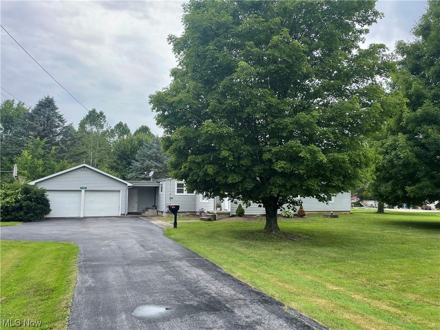 Have you been looking for that affordable home in the country?  HERE IT IS!  Set an appointment right now to come see this 2 story residence today!  This home is setting on 2.7 acres in the Firelands school district.  It features 2 first floor bedrooms with a third bedroom upstairs. The bedrooms have hardwood floors.  The bathroom is all new and the floor is HEATED!!! The living room is enormous!  There is a big eat-in country kitchen for cooking up those favorite meals.  The home has gas forced air heat and central air conditioning.  There is an oversized 2 car garage and a full basement