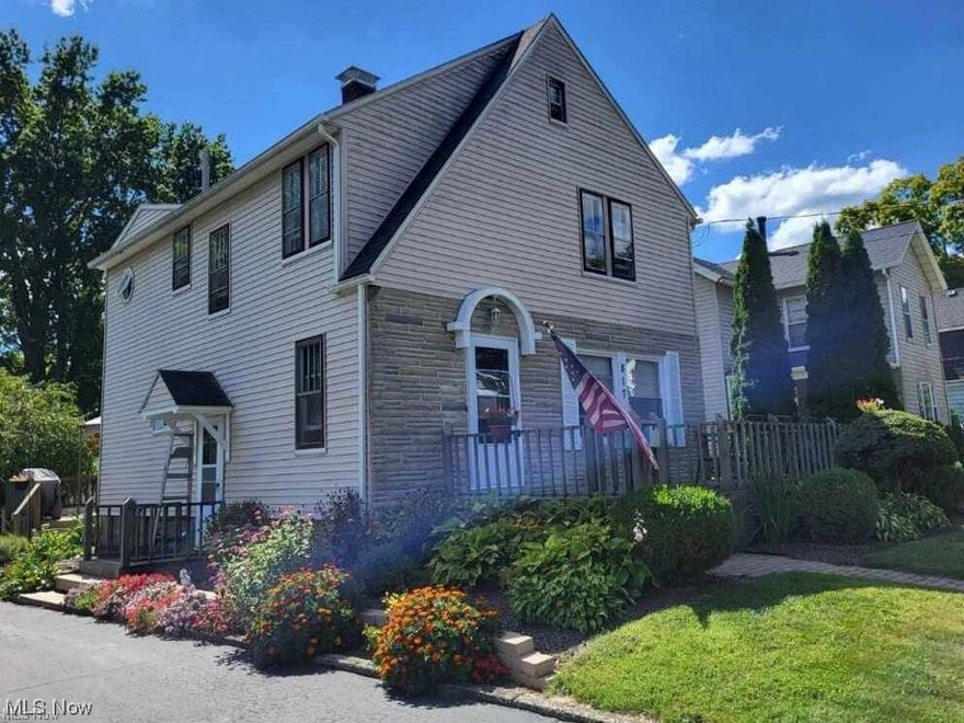 This is country in the city! Very well-maintained 3 bedroom, 2.5 bath home nicely situated on two park-like lots. Fine features include mahogany woodwork, spacious living room with propane fireplace, formal dining room with charming window seat, beautifully-updated kitchen with maple cabinetry and an island equipped with mini fridge. Both second floor bathrooms have been updated with new fixtures, plumbing, and electrical. The exterior offers a detached 2 car garage with 220 line and new waterline, 2 storage sheds, firepit, deck and mature landscaping. Ideally-located near Waddell Park and the Wellness Center.