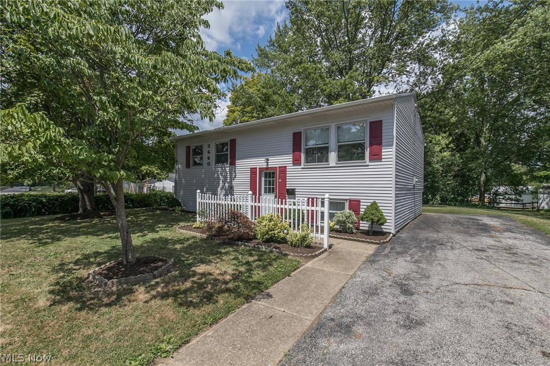 This charming bi-level w/ a spacious yard and rear deck is a great find for the buyer looking to do a house makeover on a budget. Close to 59 & 91 yet tucked away on a low-traffic street! Plenty of room to play outside, host bonfires, etc. Newer roof. Kitchen, living and hallway with new wide plank LVT. In 2017, LVT was installed in basement; washer/dryer/laundry tub and drain added; new gutters installed; electric panel & service entrance replaced, 3 prongs installed. Also in 2017, basement foundation walls and around windows was sealed & attic insulation added for better energy efficiency! Lower Level, while not fully finished, includes a half bath and has laminate flooring throughout! Back yard storage shed. New Dishwasher, 2019. House exterior has had facelift w/ new coat of paint and fresh shutters. Also, fresh professional landscaping for that HGTV curb appeal! Washer/dryer included. One-year home warranty included for buyer peace of mind.