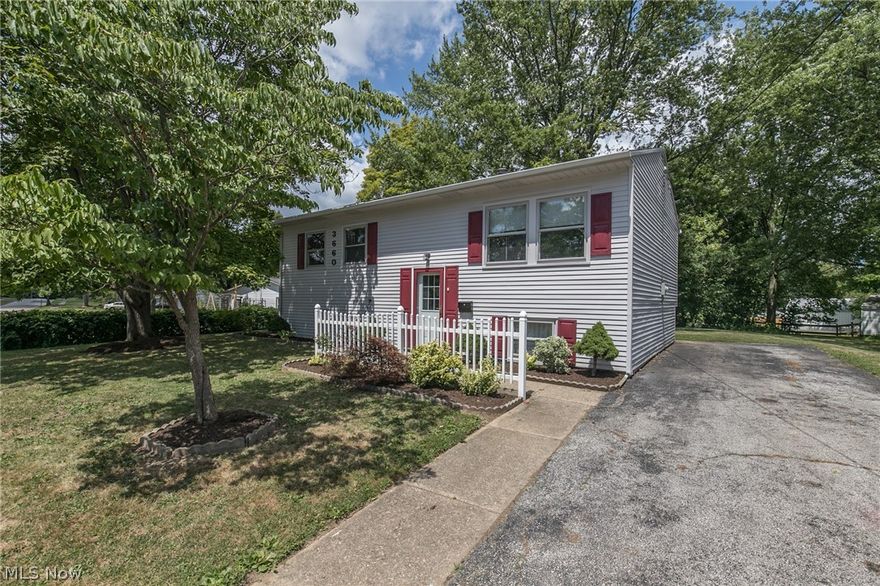 This charming bi-level w/ a spacious yard and rear deck is a great find for the buyer looking to do a house makeover on a budget. Close to 59 & 91 yet tucked away on a low-traffic street! Plenty of room to play outside, host bonfires, etc. Newer roof. Kitchen, living and hallway with new wide plank LVT. In 2017, LVT was installed in basement; washer/dryer/laundry tub and drain added; new gutters installed; electric panel & service entrance replaced, 3 prongs installed. Also in 2017, basement foundation walls and around windows was sealed & attic insulation added for better energy efficiency! Lower Level, while not fully finished, includes a half bath and has laminate flooring throughout! Back yard storage shed. New Dishwasher, 2019. House exterior has had facelift w/ new coat of paint and fresh shutters. Also, fresh professional landscaping for that HGTV curb appeal! Washer/dryer included. One-year home warranty included for buyer peace of mind.