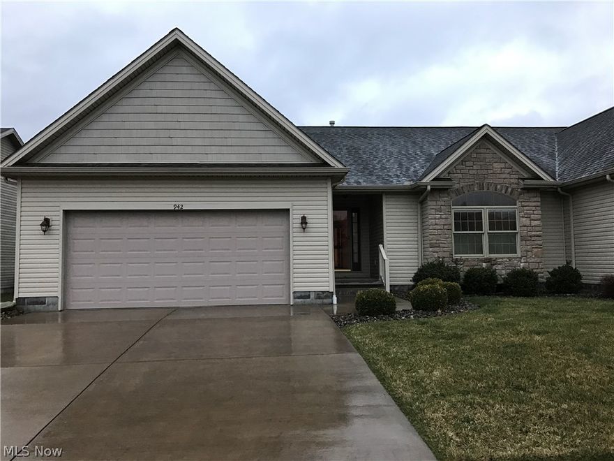 Pristine open floor plan 2 bedroom condo.  All appliances stay plus HOME WARRANTY.  Unfinished basement with plumbing for bath. 2 car garage.
 Priced much lower that that new construction. Call for more details.