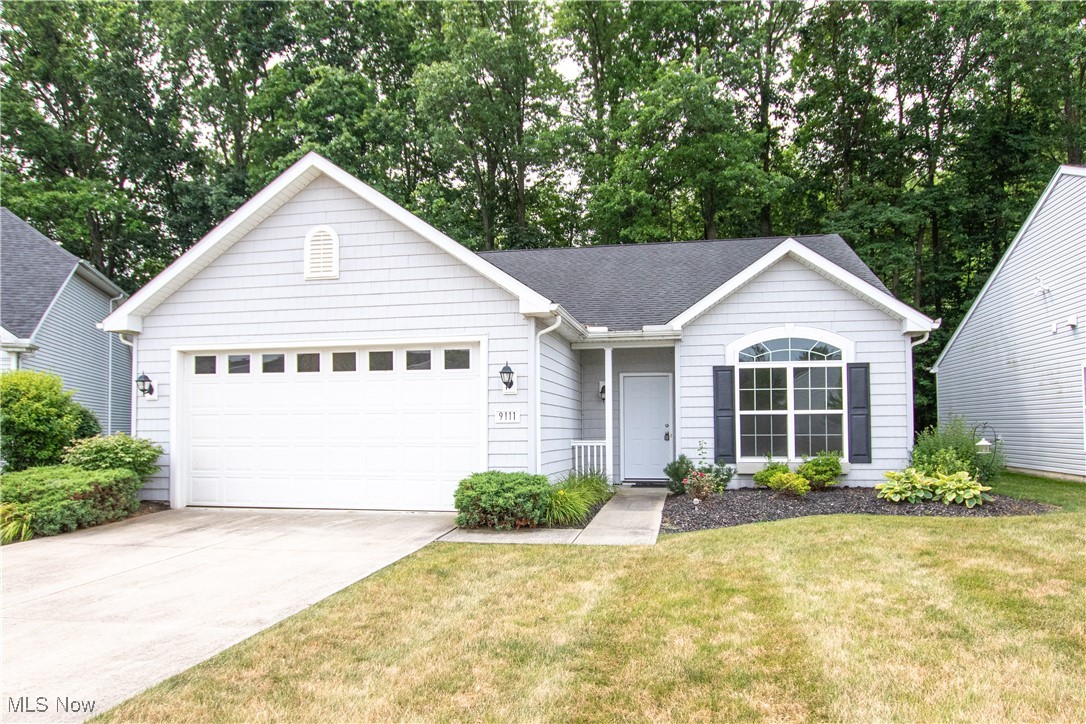 Welcome to low-maintenance living at its finest in the desirable Falls Pointe community of Olmsted Falls! Built in 2015, this beautifully maintained ranch-style cluster home offers the perfect blend of style, comfort, and convenience. Step inside to a light-filled, open floor plan featuring brand new luxury vinyl plank flooring and a vaulted ceiling in the spacious family room—ideal for everyday living or entertaining. The kitchen and dining area flow seamlessly, making gatherings a breeze. The private primary suite is tucked away at the back of the home, offering peaceful views of the wooded area beyond—your own personal retreat. On the opposite side of the home, you’ll find a second bedroom and a full bath, perfect for guests. A versatile flex room at the front of the home—with a large picture window—makes a great office, reading nook, or craft space. Located in the sought-after Falls Pointe community, your HOA includes lawn care and snow removal for truly easy living. Even better? You’ll enjoy access to the neighborhood pool—just in time for those hot summer days! If you're looking to simplify or just enjoy one-floor living in a private setting, this home is the perfect fit.