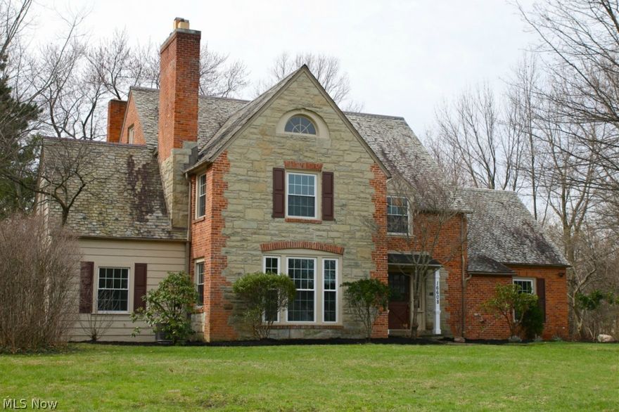 Rare opportunity to own a 2013 Don-Pre Renovation remodeled Shaker Heights home on over an acre. This exquisite home has every upgrade imaginable and is a knock out!  Incredible gourmet Kitchen with top of the line stainless steel appliances, granite, backsplash & self-closing custom glazed maple cabinets. Addition to the back of the home incorporates a first floor Sun Room with fireplace & walls of windows overlooking the huge back yard. 5 fireplaces! Formal Living Room, Dining Room & Library all have hardwood floors and each has a fireplace! 5 bedrooms and 5 full bathrooms! Every bedroom has it's own en-suite remodeled and updated bathroom in 2013. Huge Master Suite has 11x0 walk-in closet as well as its own Master Bathroom with double sinks. Third floor Suite has 18x11 bonus room/sitting room as well as a small kitchenette area, bedroom and full bathroom! Finished Lower Level Rec room has a dry bar & half bathroom and has been set up with a 145" projection screen TV which stays with