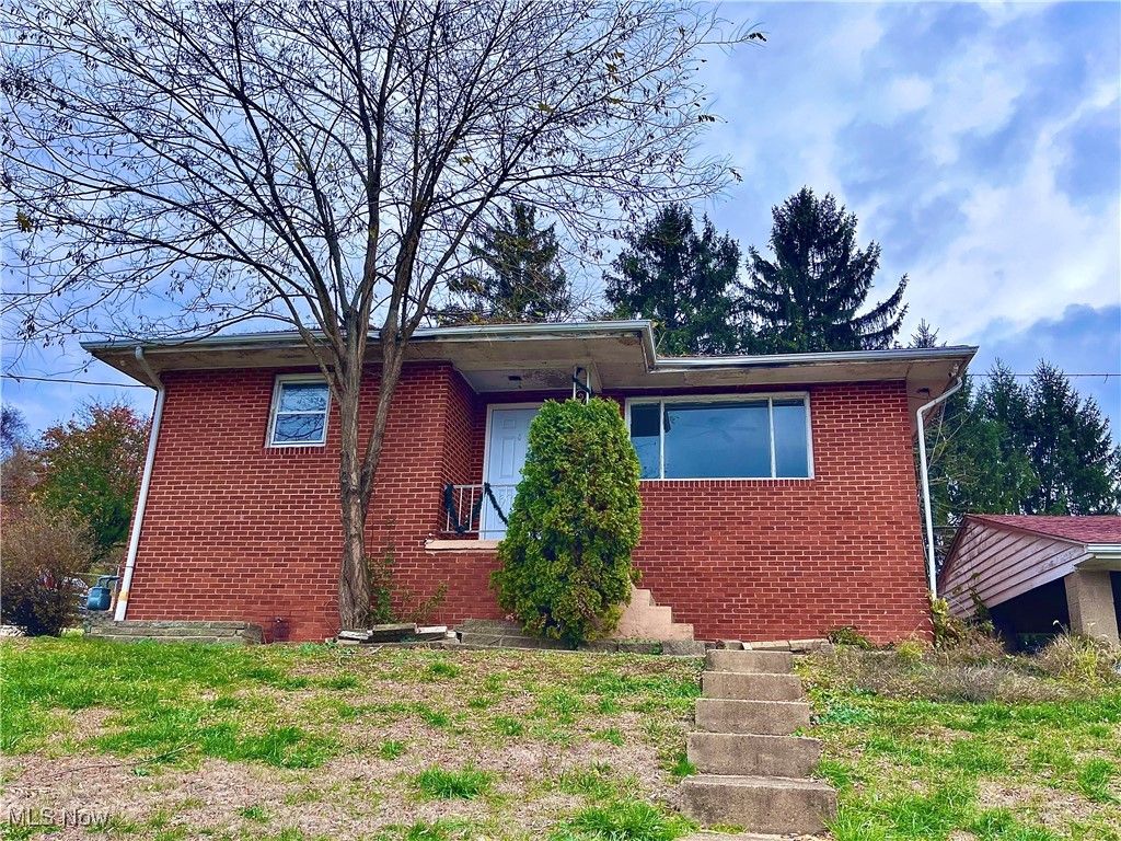 Photo of 809 Delia Avenue, Martins Ferry, OH 43935 (MLS # 5176195)