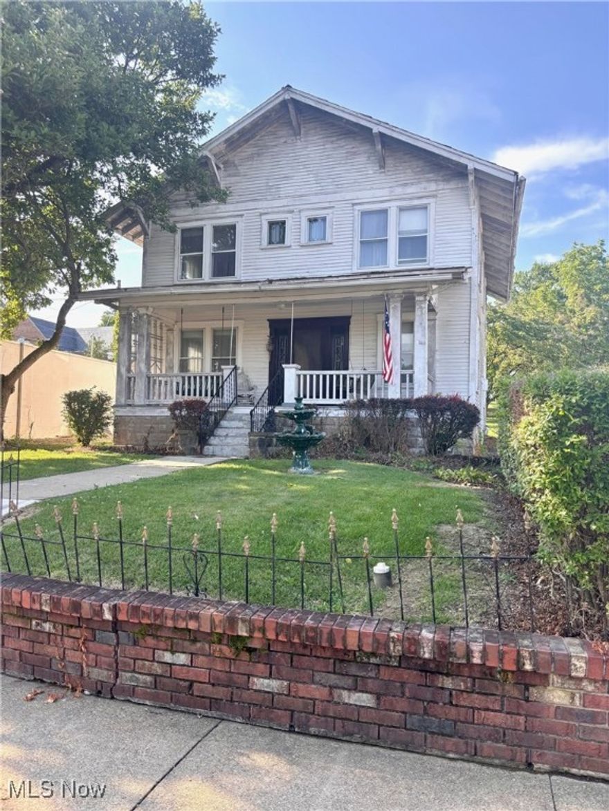 Step back in time and enjoy the beauty and luster of this lovely craftsman style home situated in the heart of the Village of New Concord.  This home is in need of love and repair but the end result would be a huge reward.  There is amazing wide natural woodwork throughout.  Gorgeous solid interior doors.  You will be greeted by the amazing leaded glass front door with matching side transoms.  Then welcomed into the living room by the stunning fireplace with builtin mirror to reflect the natural light flowing throughout.  Fabulous double pocket doors separate the living room from the formal dining room (and who doesn't love a formal dining room?)  And the stairway is incredible!  Upstairs has 4 very large bedrooms (2 of them have leaded glass windows).  High ceilings and lots of natural light throughout.  Hardwood under carpet.  1 full bath on the main level and one full bath upstairs.  Full basement.  Newer gas hot water tank.  Nice level lot located very close to Muskingum University and all other amenities that this sweet Village has to offer.  
Currently 4 bedroom with possible 5th making this ideal for college students.  Would also make a perfect office or retail location.  Buyer is encouraged to do their own due diligence regarding the zoning.
Agent related to seller.