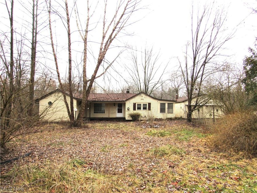 Great opportunity!  Come and view this home on a waterway with access to Long Lake!  Sold as is.  This home offers endless possibilities of being close to everything that Portage lakes offers.  From boating in the summer and hopping from restaurant to restaurant.  Make this home exactly the way you want it to be and enjoy the summers in Portage Lakes.  The bonus room could be another bedroom.  Needs some TLC.  come and see!